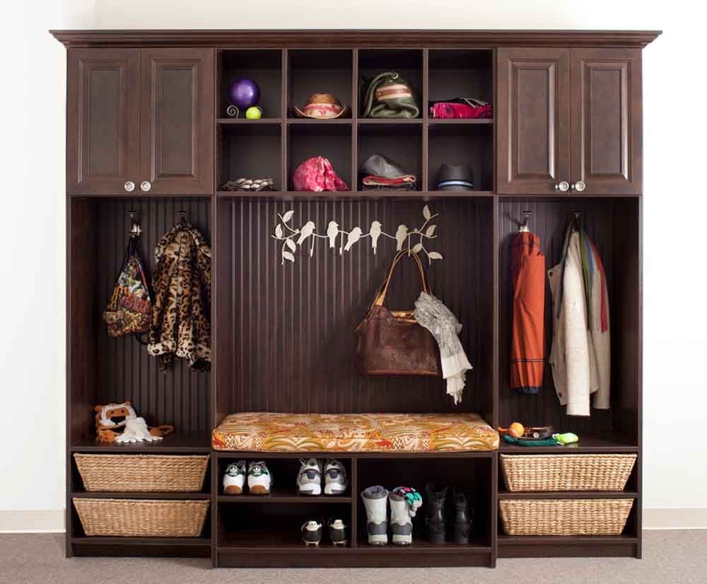 Organized mudroom and entryway with bench and locker style cubbies