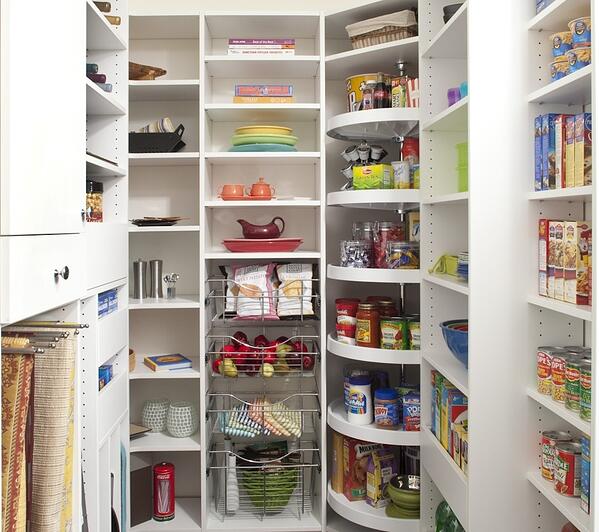 Organized pantry with Lazy Susan and customized shelving
